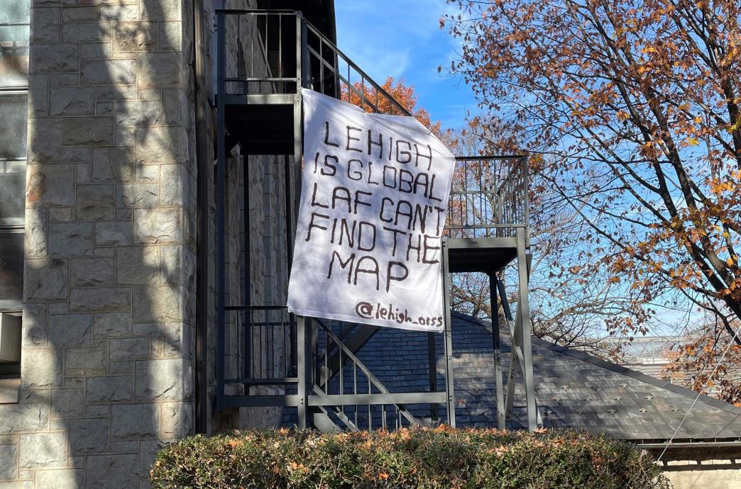 Lehigh bed sheet reading "Lehigh is global, Laf can't find the map. @lehigh_OISS"