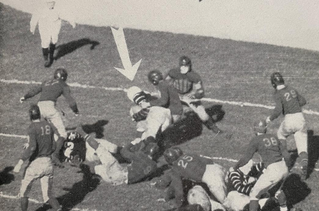 A Lehigh player moves through a group of Lafayette defenders.