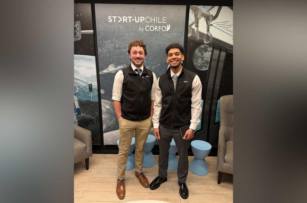 Michael and Vincent Rinaldi at Start-Up Chile. They smile while wearing business casual.