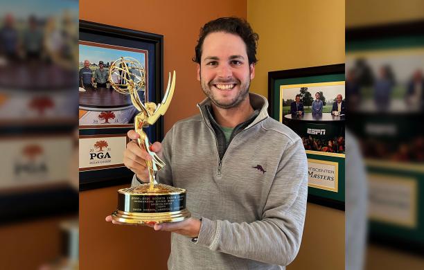 David Gordon ’15 holding his Emmy