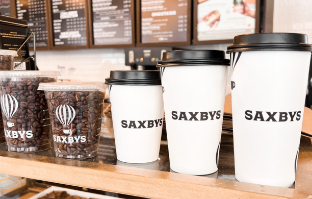Coffee cups on a Saxbys counter