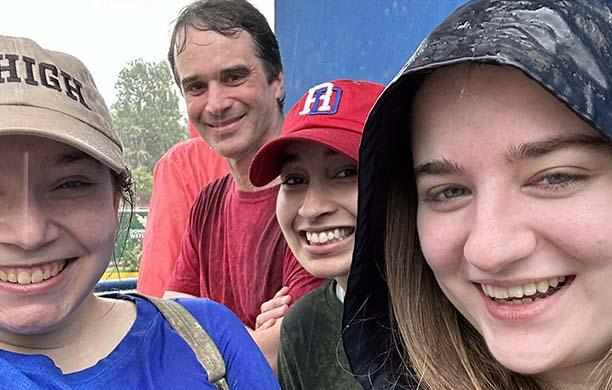 Students take a selfie in the rain in the Dominican Republic