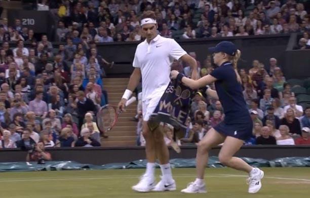 Eliza brings Roger Federer a towel