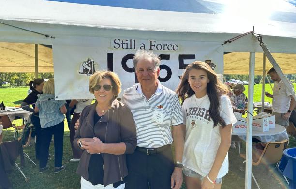 Marcia, Ron, and Alex Delfini at the Class of '65 tailgate