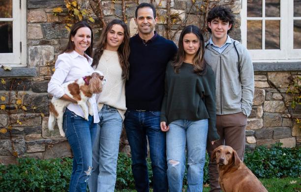 Andrew and Kimberly Handler with their three children and two dogs