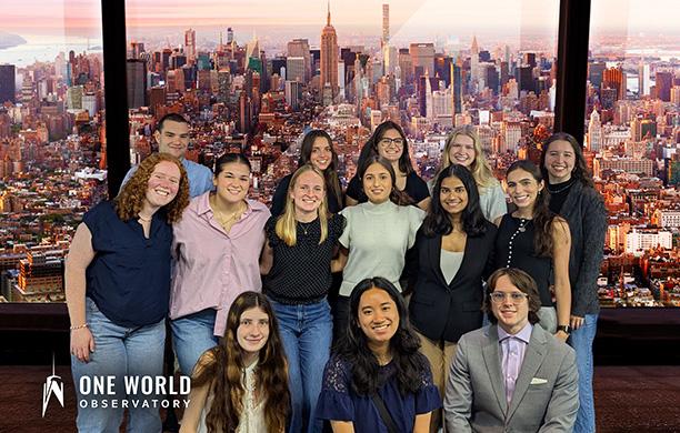 Many Soaring Together Scholars stand for a photo at the top of the World Trade Center Observatory