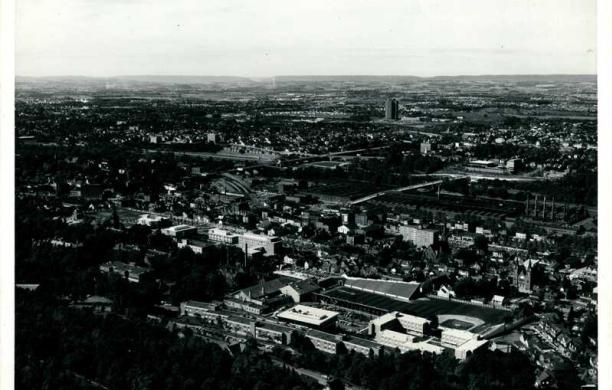 Black and white photo of an aerial shot of South Bethlehem. Lehigh is in the foreground; Martin Tower is in the background.