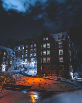 Campus building on a cloudy night