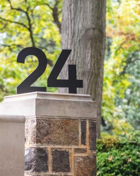 2024 Campus numbers before green foliage