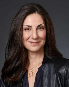 Ellen Stone wearing a black leather jacket