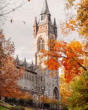 The Clayton University Center surrounded by fall foliage.