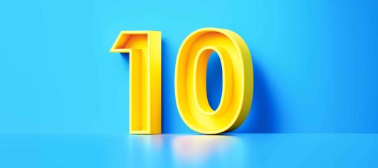 A yellow number "10" on a bright blue background