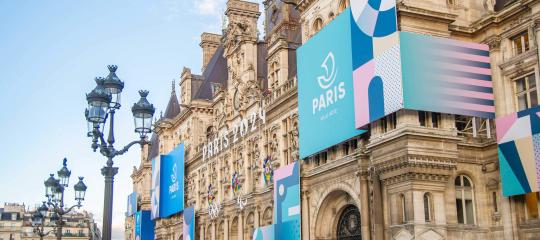 Parisian architecture, already decorated with ads about the Olympics